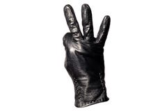 Closeup black leather glove, fingers showing number three. Isolated on white background. Concept symbols, signs, numbers royalty free stock photography Closeup black leather glove, fingers showing number three. Isolated on white background. Concept symbols, signs, numbers royalty free stock photography