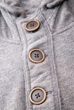 Closeup of the buttons on men hoodies. Royalty Free Stock Photos Closeup of the buttons on men hoodies. Royalty Free Stock Photos