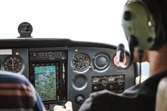 Closeup of a cockpit of cessna skyhawk 172 airplane with two pilots. stock photos Closeup of a cockpit of cessna skyhawk 172 airplane with two pilots. stock photos
