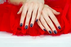 Closeup Dark Manicure On Red Royalty Free Stock Photos Closeup Dark Manicure On Red Royalty Free Stock Photos