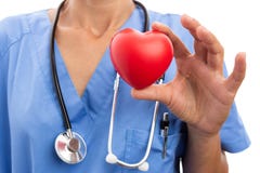 Closeup of female doctor cardiologist holding toy red heart royalty free stock images Closeup of female doctor cardiologist holding toy red heart royalty free stock images