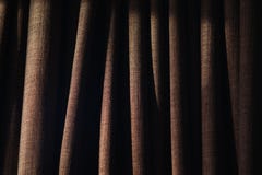 Closeup of folds on curtain with side lighting stock image Closeup of folds on curtain with side lighting stock image