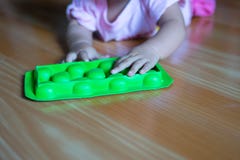 closeup hand baby newborn playing toy Royalty Free Stock Photo closeup hand baby newborn playing toy Royalty Free Stock Photo