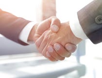 Closeup.handshake Of Business Partners Royalty Free Stock Images