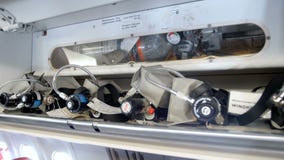 Closeup 4k video of emergency oxygen and air system at passenger jet airplane stock video footage Closeup 4k video of emergency oxygen and air system at passenger jet airplane stock video footage