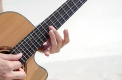 Closeup: man playing guitar his fingers Stock Photography Closeup: man playing guitar his fingers Stock Photography
