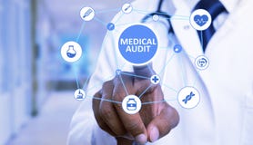 Closeup of medical audit button pressed by doctor royalty free stock photography Closeup of medical audit button pressed by doctor royalty free stock photography
