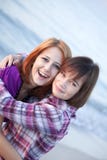 Closeup Portrait Of Two Happy Girls On The Beach Royalty Free Stock Photography Closeup Portrait Of Two Happy Girls On The Beach Royalty Free Stock Photography