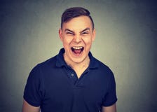 Portrait of young angry man screaming royalty free stock photography Portrait of young angry man screaming royalty free stock photography