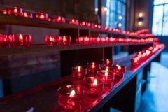 Red candles in Frankfurt dom church, germany