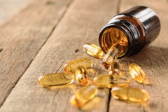 Closeup Supplements Vitamins Bottle On Wood Background Royalty Free Stock Image Closeup Supplements Vitamins Bottle On Wood Background Royalty Free Stock Image