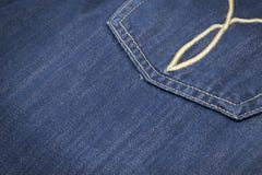 Closeup texture of back pocket blue denim jeans royalty free stock photography Closeup texture of back pocket blue denim jeans royalty free stock photography
