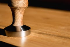A closeup view of a coffee tamper royalty free stock photography A closeup view of a coffee tamper royalty free stock photography