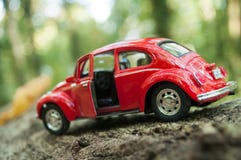 Closeup of vintage red miniature volkswagen bettle in outdoor royalty free stock image Closeup of vintage red miniature volkswagen bettle in outdoor royalty free stock image