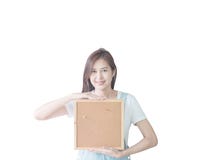 Closeup asian woman with cork board in hand with smiling face isolated on white background with clipping path Stock Photography Closeup asian woman with cork board in hand with smiling face isolated on white background with clipping path Stock Photography