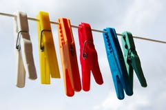 Cloth Pegs With A Under The Sky Royalty Free Stock Photography