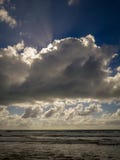 Cloud sky on the beach and beautiful tropical sea stock photo Cloud sky on the beach and beautiful tropical sea stock photo