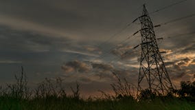 Cloudy sunset captured with tower in foreground stock images Cloudy sunset captured with tower in foreground stock images