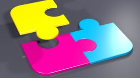 CMYK Printing Colors on 4 Puzzle Pieces