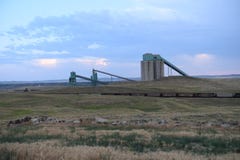 Coal train, coal mining silos, and processing operations royalty free stock photo Coal train, coal mining silos, and processing operations royalty free stock photo