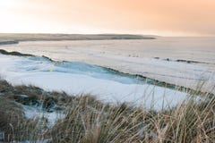 Coastal Snow Covered Links Golf Course At Sunset Royalty Free Stock Photo Coastal Snow Covered Links Golf Course At Sunset Royalty Free Stock Photo