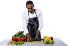 Cocinero de sexo masculino en un fondo blanco foto de archivo Cocinero de sexo masculino en un fondo blanco foto de archivo