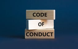 Code of conduct symbol. Concept words `Code of conduct` on wooden blocks on a beautiful grey background. Business and code of