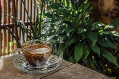 Coffee background, top view with copy space. background, cup of coffee and a smoke good morning, Hot coffee and spoon, Selective f stock image Coffee background, top view with copy space. background, cup of coffee and a smoke good morning, Hot coffee and spoon, Selective f stock image