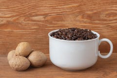 Coffee beans in a cup royalty free stock photo Coffee beans in a cup royalty free stock photo