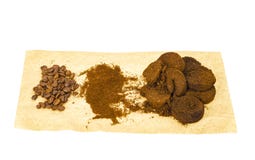 Coffee beans, ground and pressed espresso residues. Studio Photo