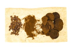 Coffee beans, ground and pressed espresso residues. Studio Photo