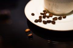 Coffee beans on the plate stock photo Coffee beans on the plate stock photo