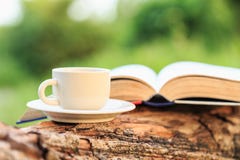 Coffee cup and book on wood royalty free stock images Coffee cup and book on wood royalty free stock images
