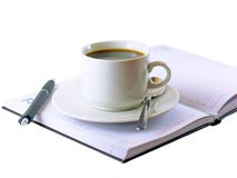 Coffee Cup, Standing On The Daily Organizer. Stock Photo Coffee Cup, Standing On The Daily Organizer. Stock Photo