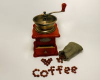 Coffee grinder on white background stock photos Coffee grinder on white background stock photos