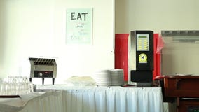 The coffee machine and toastier on table stock video The coffee machine and toastier on table stock video