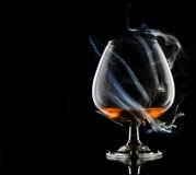 Cognac In Smoke Royalty Free Stock Photos