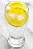 Cold mineral water with ice and lemon. Stock Photos Cold mineral water with ice and lemon. Stock Photos