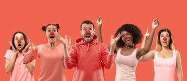 The collage of faces of surprised people on coral backgrounds. royalty free stock photo The collage of faces of surprised people on coral backgrounds. royalty free stock photo