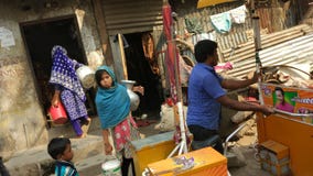 Collecting drinking water in the Slum area royalty free stock photos Collecting drinking water in the Slum area royalty free stock photos