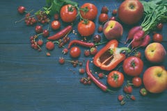 Collection of fresh red fruits, vegetables and bean. Healthy food concept. Vegetarian product. Organic Raw Produce. Stock Image Collection of fresh red fruits, vegetables and bean. Healthy food concept. Vegetarian product. Organic Raw Produce. Stock Image