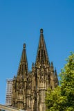 Cologne domkyrkatorn och blå himmel royaltyfri bild Cologne domkyrkatorn och blå himmel royaltyfri bild