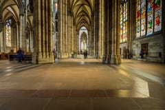 COLOGNE, GERMANY - AUGUST 26: walk way inside the Cologne Cathedral on August 26, 2014 in Cologne, Germany. commenced in 1248 and royalty free stock image COLOGNE, GERMANY - AUGUST 26: walk way inside the Cologne Cathedral on August 26, 2014 in Cologne, Germany. commenced in 1248 and royalty free stock image