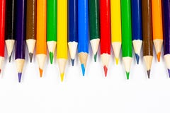 Color pencils lined up in a row against a white background royalty free stock photos Color pencils lined up in a row against a white background royalty free stock photos
