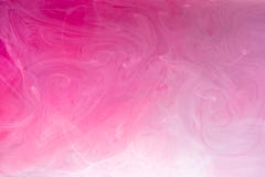 Colore di acqua bianco e rosa in acqua Fotografia Stock Libera da Diritti Colore di acqua bianco e rosa in acqua Fotografia Stock Libera da Diritti