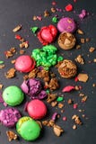Crumbled Macaroons on black background, flat lay view. stock image Crumbled Macaroons on black background, flat lay view. stock image