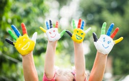 Colored Hands With Smile Painted In Colorful Paints Royalty Free Stock Photos