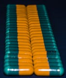 Capsules or medicine pills of colors stock photo Capsules or medicine pills of colors stock photo