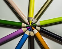 colored pencils arranged centrally on a white background stock photo colored pencils arranged centrally on a white background stock photo