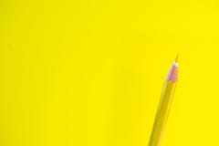 Colored pencils on a yellow background with space for text stock photo Colored pencils on a yellow background with space for text stock photo